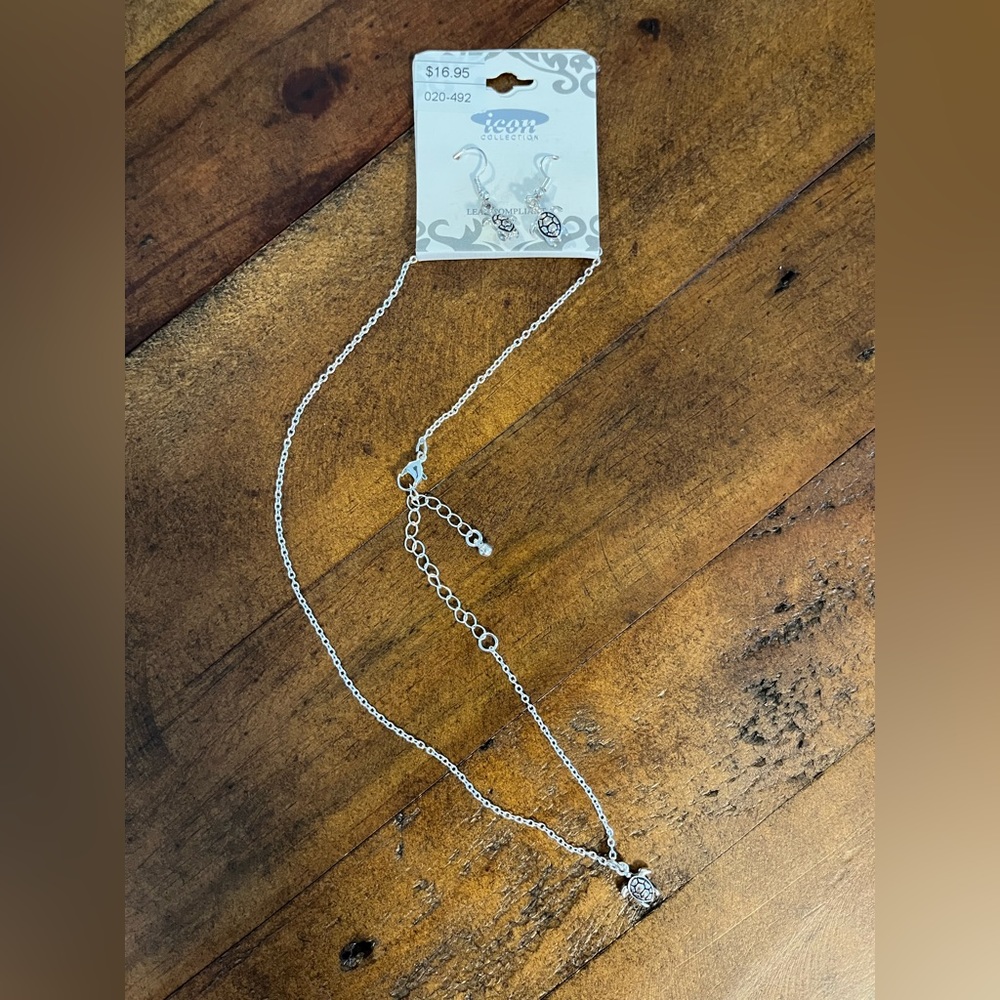 Icon Collection Turtle Necklace and Earrings set, unopened.